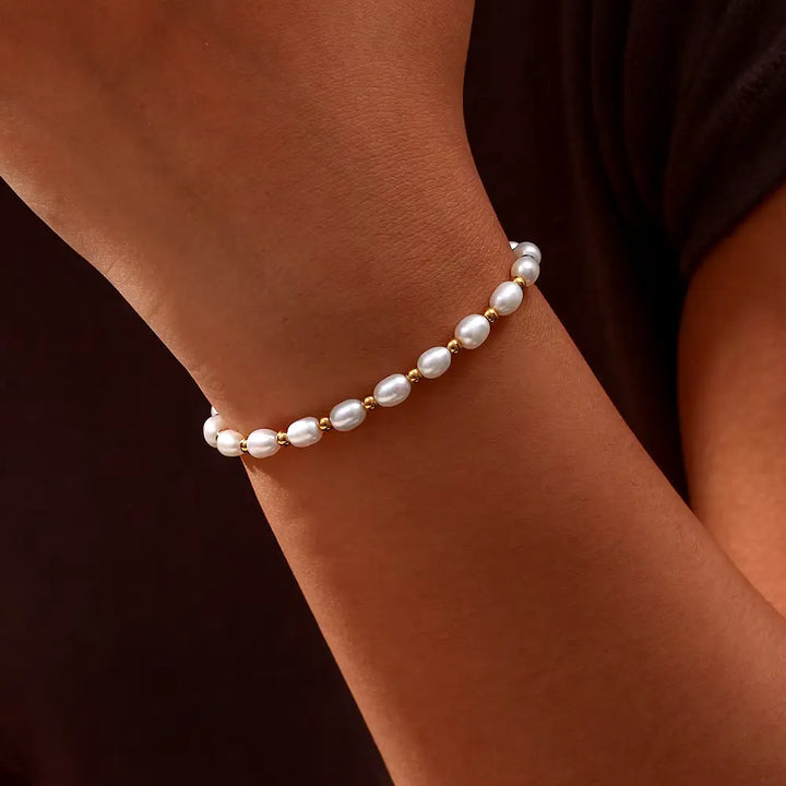 Elegante armband met parels in goud
