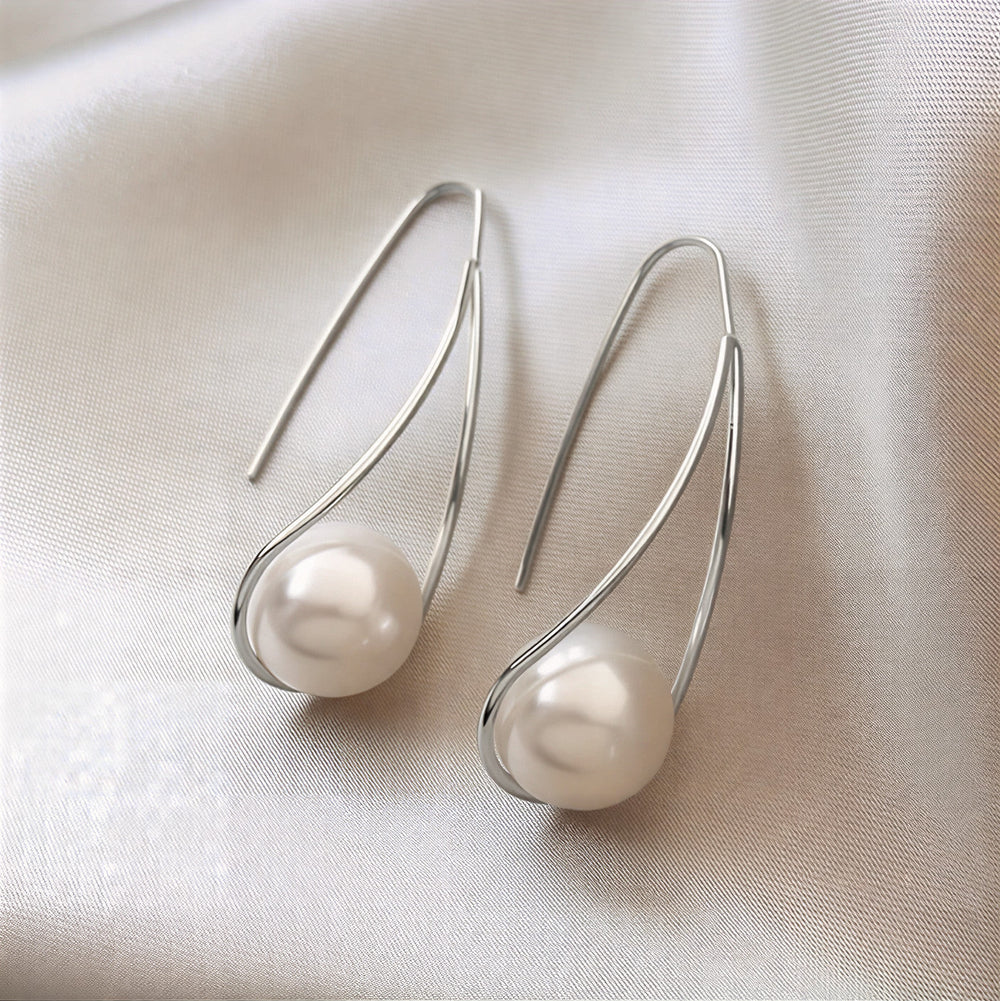 Elegante oorbellen met mystieke parel