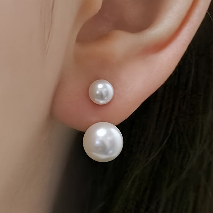 Statement oorbellen met dubbele parel