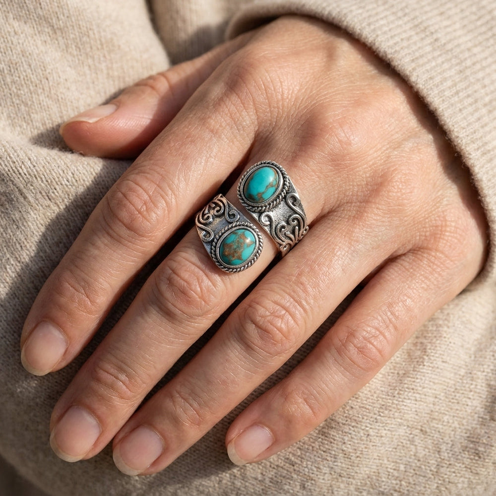 Calista gewikkelde ring in zilver met dubbel turkoois